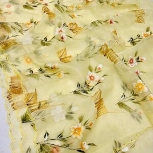 Floral yellow organza saree with pastel flower print and scallop border